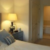 Photo 4: view of ensuite bathroom with wardrobes on left.
