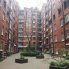 Photo 2: The courtyard inside the mansion block.