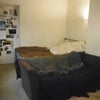 Photo 2: Bedroom door, double bed and sofa (which could fit against the wall)