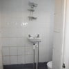 Photo 5: bath room/ we room with toilet and shower