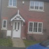 Photo 3: front of House