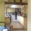 Photo 5: The kitchen from the breakfast area