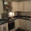 Photo 2: Kitchen with fridge/freezer, oven, microwave, dishwasher
