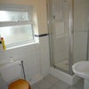 Photo 4: Downstairs bathroom with a separate shower cubicle