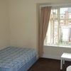 Photo 5: Large double bedroom with white furniture