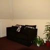 Photo 2: Sofa and angle of room
