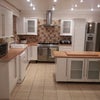 Photo 3: Kitchen/Diner/Living area with patio doors onto a large well maintained garden
