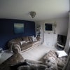 Photo 4: The lounge, is a lot brighter than the picture looks