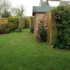 Photo 4: Rear garden and storage shed