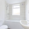 Photo 4: BRIGHT BATHROOM