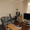 Photo 4: Living Room - Large room, with a couch and two large chairs and big TV