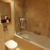 Photo 2:  Sink and bigger mirror to the left
