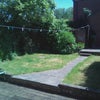 Photo 6: Storage for bikes etc. in the garage at the top of the garden.