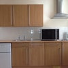 Photo 1: Kitchen area