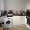 Photo 4: Kitchen.  White goods included.
