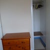 Photo 4: Large cupboard for storage and hanging clothes