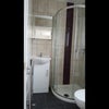 Photo 8: Shower in one of the rooms