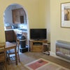 Photo 2: Shared dining area/kitchen