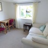 Photo 3: The living room with picture window to garden