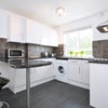 Photo 2: Kitchen w/breakfast bar