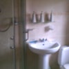 Photo 4: Shower and toilet