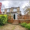 Photo 6: View of House from Garden