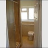 Photo 4: Large double shower, with marble worktop, basin and loo and heated towel rail.