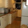 Photo 3: Kitchen with own fridge and cupboards