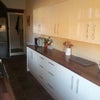 Photo 2: Newly fitted mordern kitchen large american style fridge frezzer and intergrated oven