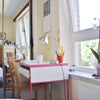 Photo 2: Bdrm1: double bed, radiator, desk, built-in wardrobe.