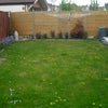 Photo 7: Large Garden with storage area in Garage.