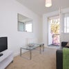 Photo 6: Lounge leading on to balcony