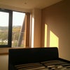 Photo 2: Room Available. Leads out to own Balcony (TV will be removed!)