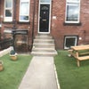 Photo 4: Tidy front garden with bench for BBQs , relaxing