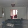 Photo 2: Living room through to 'quiet room'