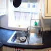 Photo 5: Kitchen with dishwasher and large fridgefreezer