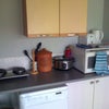 Photo 5: Cooking area (we have now installed a full size oven in the kitchen)
