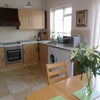 Photo 4: large kitchen diner with french doors to garden