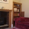 Photo 2: Living room with TV and other sofa out of shot.