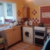 Photo 4: Kitchen looking towards dining area