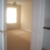 Photo 4: double doors leading from kitchen to living room