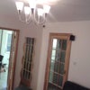 Photo 5: dinning room accesible from the livinroom also, with kitchen on the right