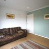 Photo 2: shared living room, 2 sofas, tv