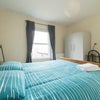 Photo 1: Large Kingsize Bed