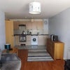 Photo 2: living room/kitchen