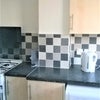 Photo 2: Modern Kitchen with washing machine, Tumble dryer, Large Fridge Freezer and Microwave