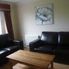 Photo 5: Large HD Smart TV and leather sofas