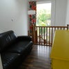 Photo 2: lounge, stairs down to kitchen