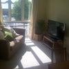 Photo 2: Living room with tv