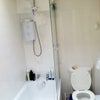 Photo 5: toilet, shower and bath on the same floor as bedroom